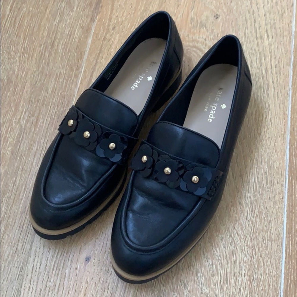 Black loafer with gold flower detail